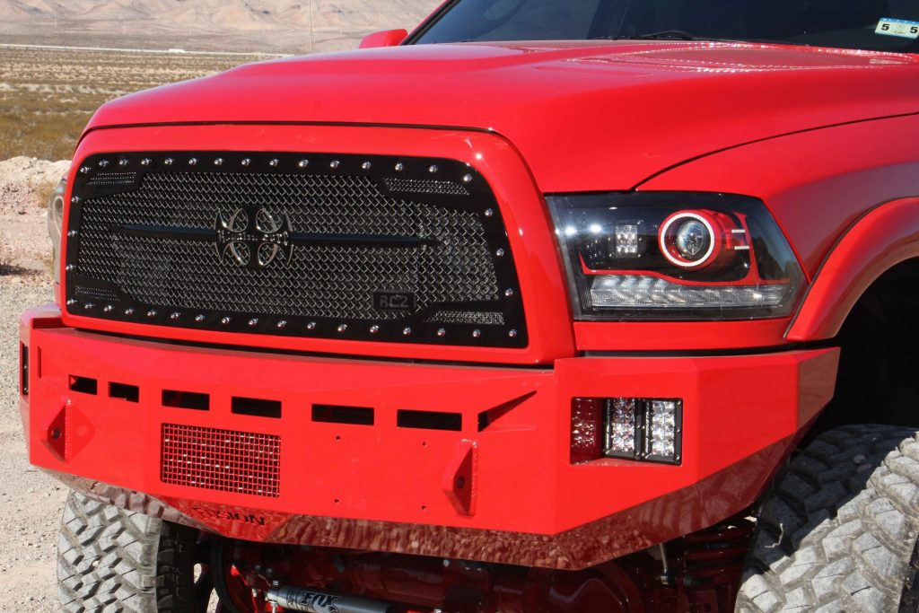 Fusion bumpers, color matched by 5 Kings, protect the front and rear of the truck. Up front a Royalty Core RC1 grille replaced the stock plastic unit.