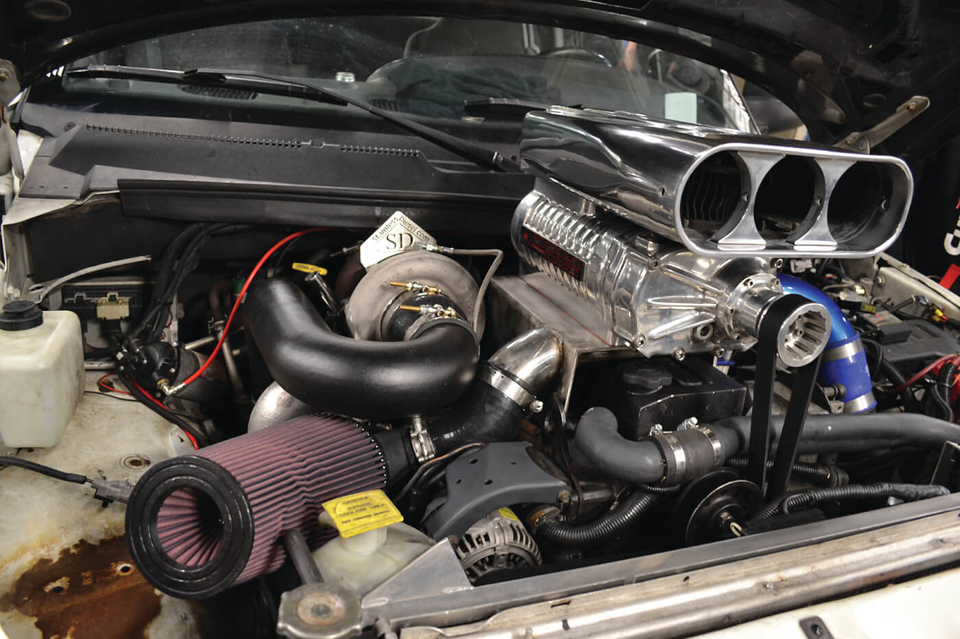 Probably the coolest engine bay at the event belonged to this supercharged, twin-turbo Dodge.