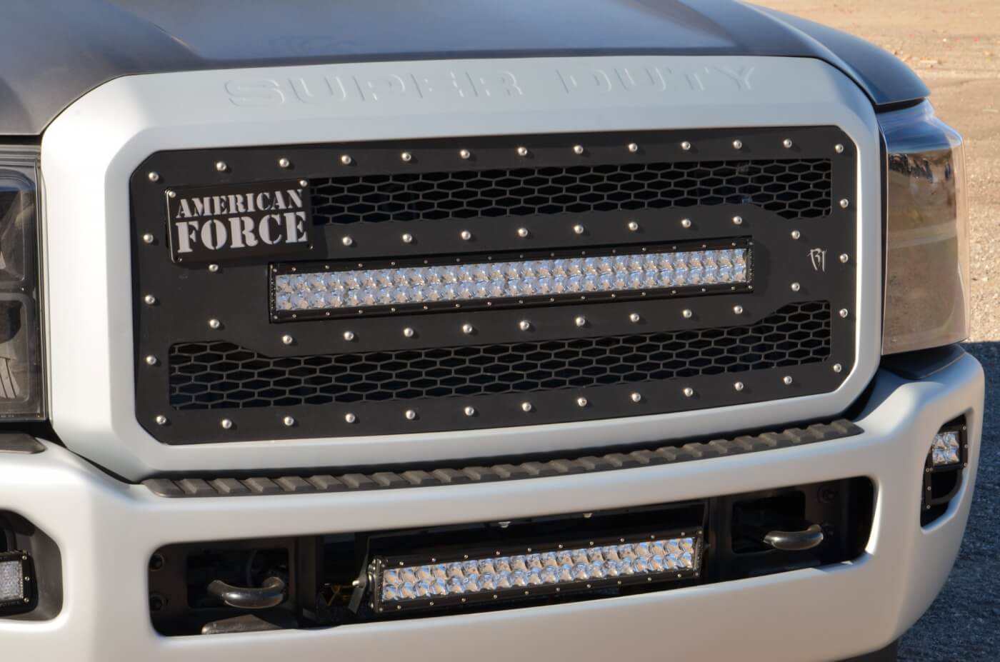It’s all Rigid up front, starting with their 40566 grille insert and a pair of E Series LED light bars, also from Rigid.