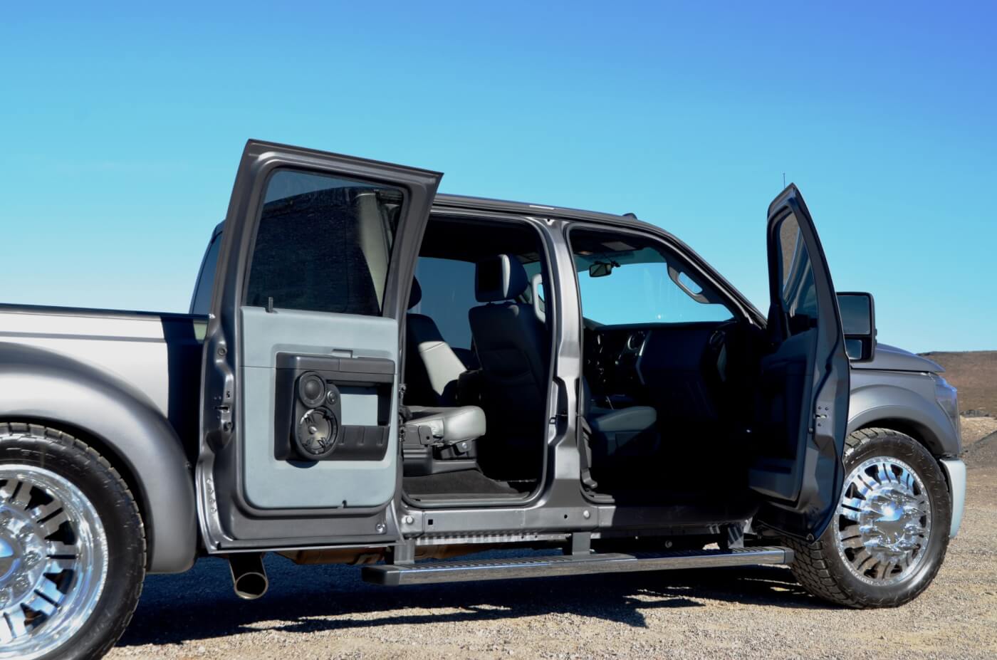 Extensive work was done to reinforce the rear doors which eliminated any sagging when open, which is common with aftermarket suicide door modifications. 