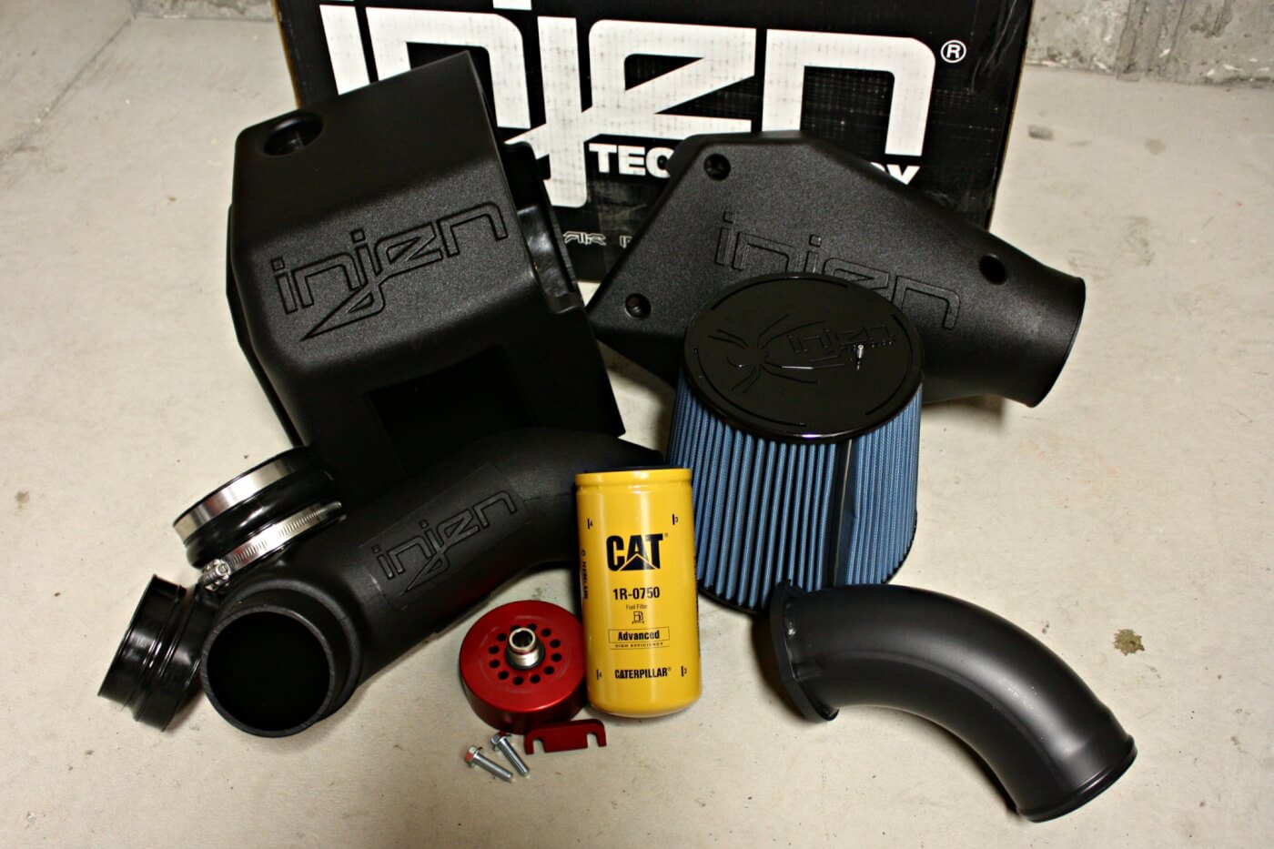 The new line of Evolution air induction systems from Injen Technology offer a plastic injection-molded sealed box and high flow for incredible fit and function. When paired with the Deviant Race Parts High-Flow Turbo Intake Horn (lower right) it will offer better filtration with improved flow. The Deviant Cat Fuel Filter Adaptor will also be installed to replace the factory-style fuel filter to reduce future maintenance costs while improving filtration before the CP3 and injectors.
