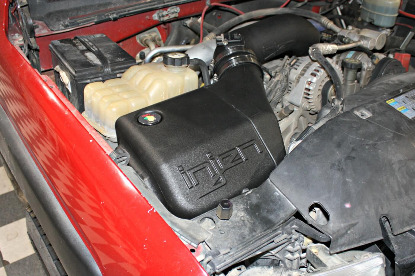 The completed Evolution induction system has near perfect fit and finish. The closed sealed box will help keep under hood temperatures from reaching the filter and the easy to read filter minder lets owners know when a filter cleaning is needed. Injen’s chassis dyno testing showed 21 hp and 46 lb-ft torque gained on an otherwise stock LB7.