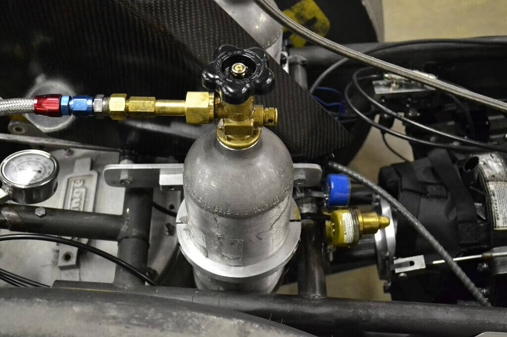 Going fast doesn't come without breaking some parts. The single CO2 bottle on the dragster that controls the shifting has since been replaced with dual bottles, after some low-pressure situations resulted in burned-up parts.