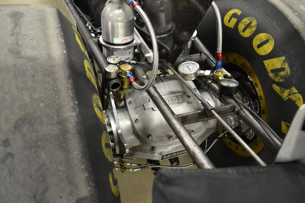 The rear-end of the dragster is standard Top Alcohol fare: a 9.5-inch aluminum top-loader. However, the rear has been fitted with specially made 2.73 gears that Dan bought from a fellow racer, which gives the dragster the needed gearing to go through the traps at 226mph--even with a 1:1 final gear in the Lenco.