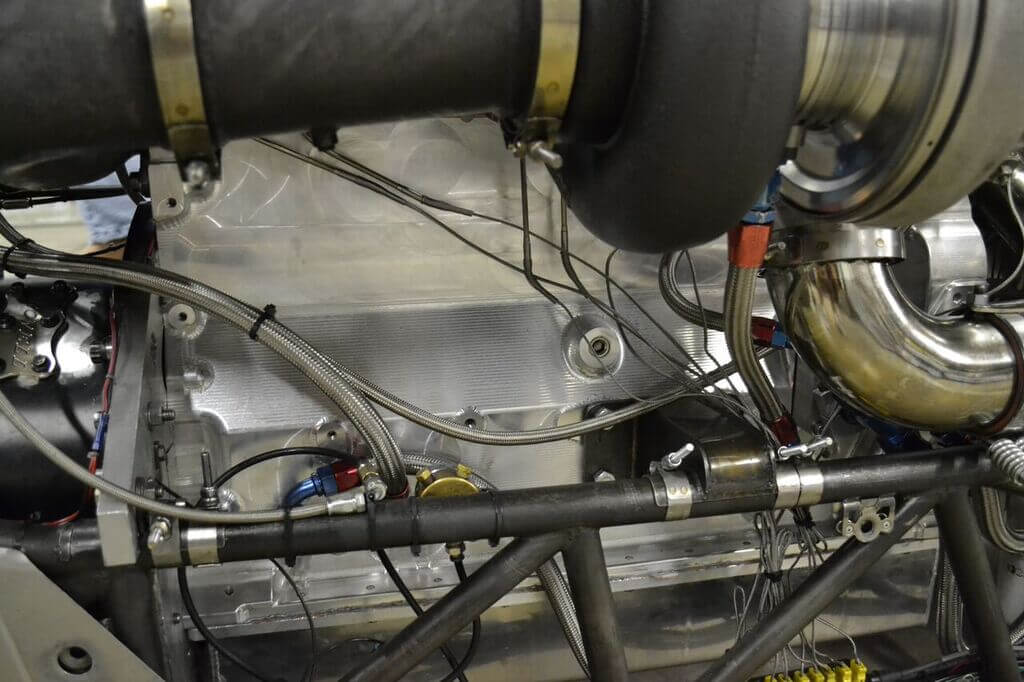 An all-aluminum block is a big key in both weight savings and durability. With cross-bolted mains, a ZZ Fabrications wet sump oil pan, and internal sleeves, the base of this wild powerplant has been bulletproof so far.