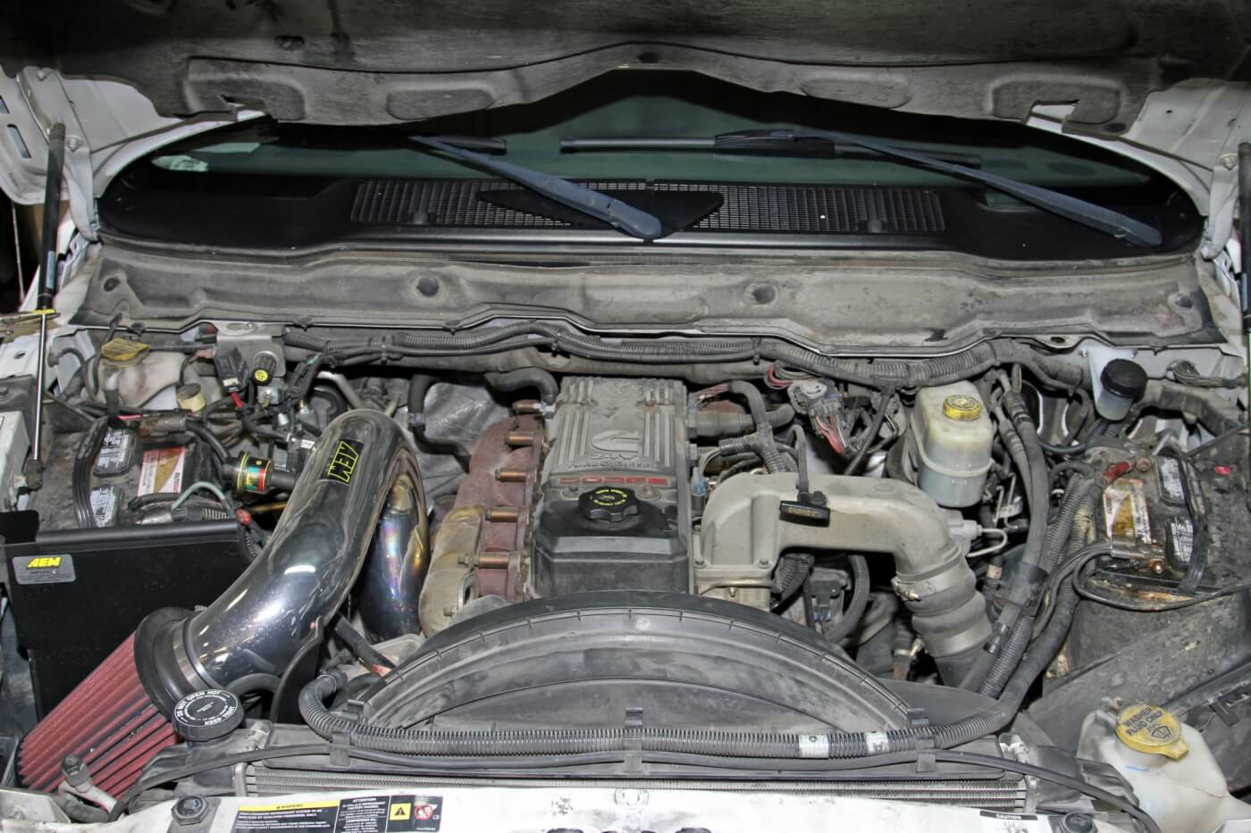 1. The AEM intake is the main thing you see when you open the hood; in this article, we'll be addressing issues that aren't as easy to see while we upgrade the fuel system.