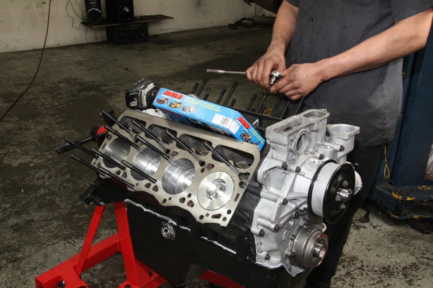 Here you see an ARP head stud kit being installed on a Ford 7.3L diesel.