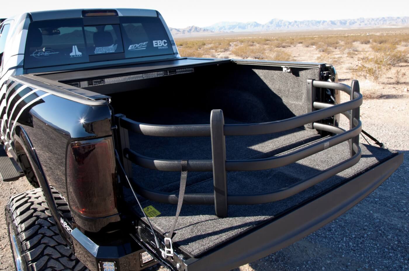 This Amp Research Bed Xtender helps keep bikes and other gear in when the tailgate is down, but folds in or can be removed as needed. The bed also features a Bed Rug bed lining. Pace Edwards power bed cover and M2 Fab, twin in-bed mountain bike mounts.