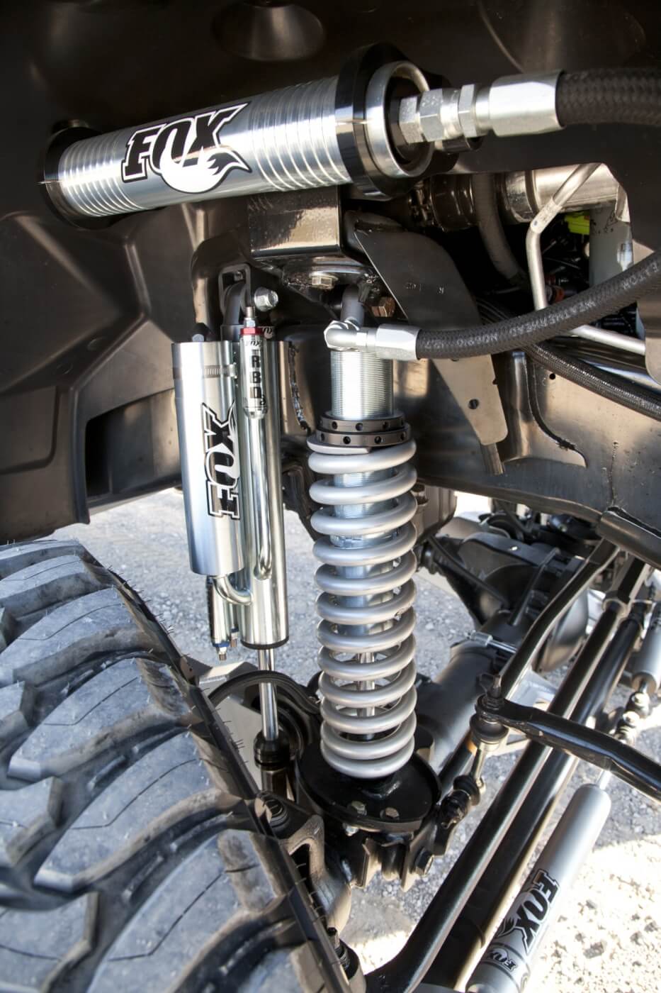 The front OEM struts have been upgraded to a set of Fox 2.5 coil-over shocks with remote reservoir and Eibach springs. In addition to these, a set of Fox piggy back, 3-tube bypass 2.5 shocks also help to smooth the ride, on and off the pavement. 