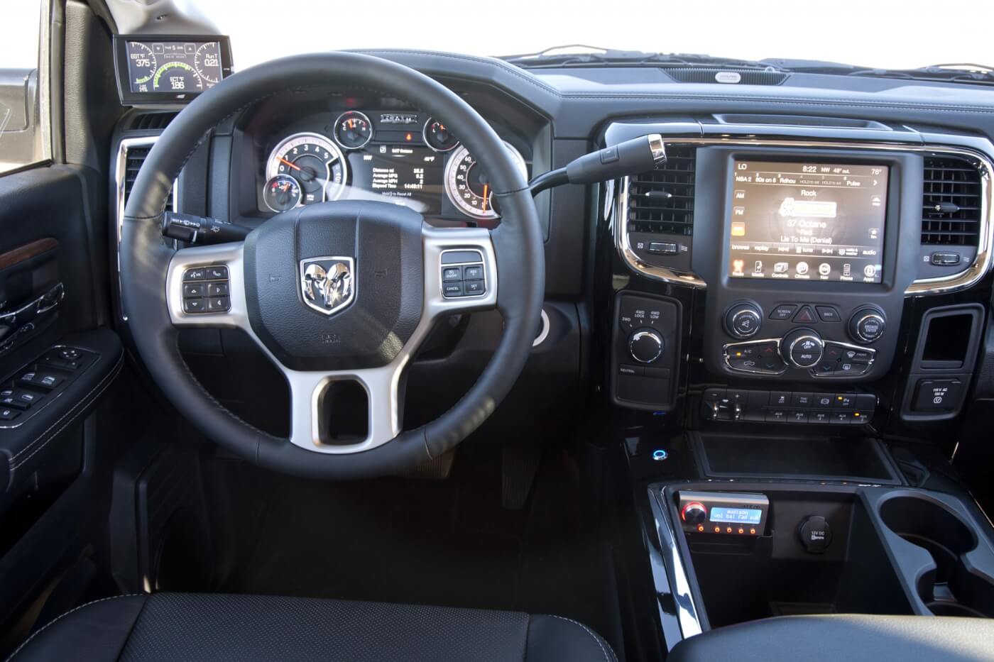 The dash was kept mainly stock with the exception of an Edge CTS and controller for the truck’s stereo system.