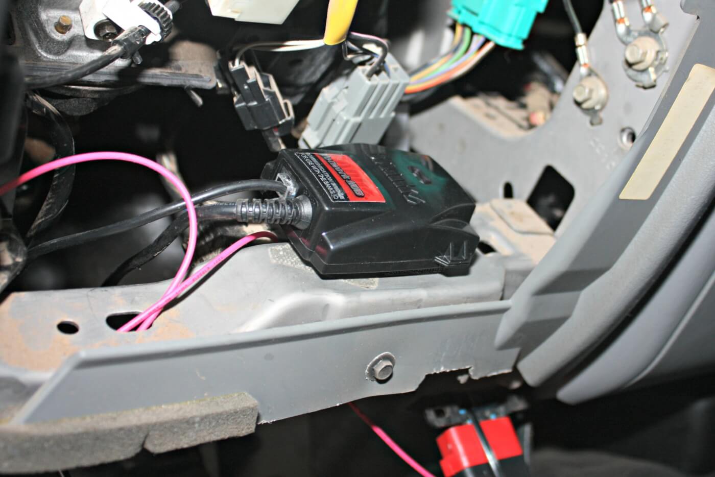 12. The Banks Network Hub is installed under the dash and will help send data sent from the OBD-II port, EGT probe, and Six Gun Tuner to the iQ monitor. You’ll also need to tap into a key-on fuse 12-volt power source, which will be located within the fuse panel under the dash.