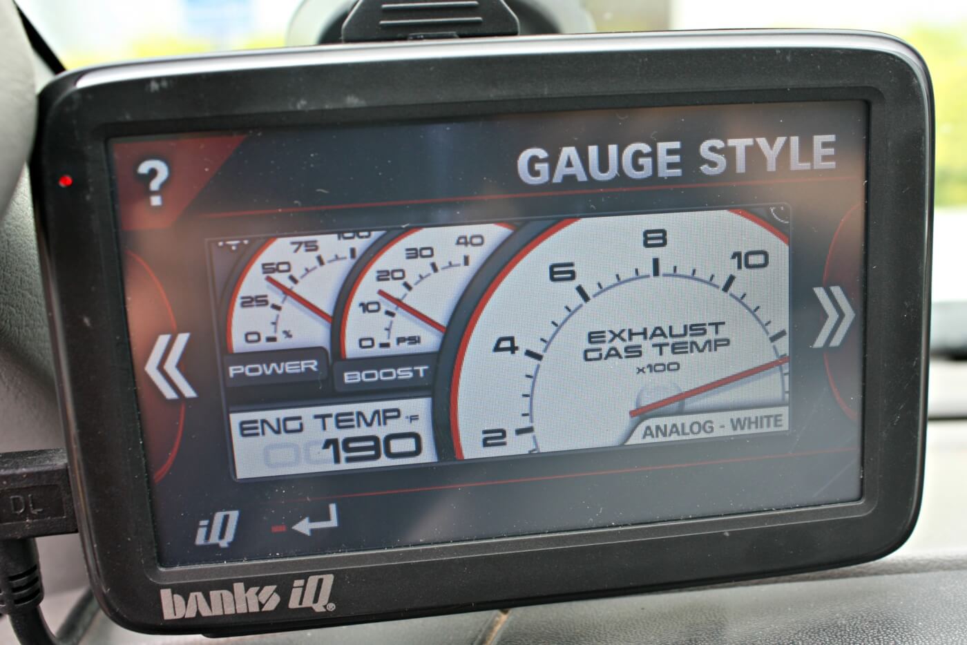 14. The iQ has multiple one-of-a-kind gauge displays you can choose from depending on your own preferences: The white face analog gauges give that old-school look with the new-school technology. You can also select the background colors or watch a Fuel Mileage Calculator screen to help monitor mileage driven, price per gallon, estimated mileage, and cost per mile.