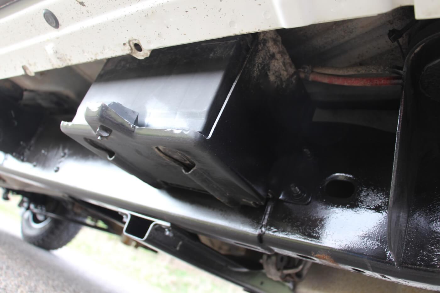 With the billet S475 taking the place of the passenger side battery, it had to be relocated. Conveniently, the Wehrli Custom Fabrication compound turbo kit came with a battery tray that effectively mounted it to the passenger side frame rail.