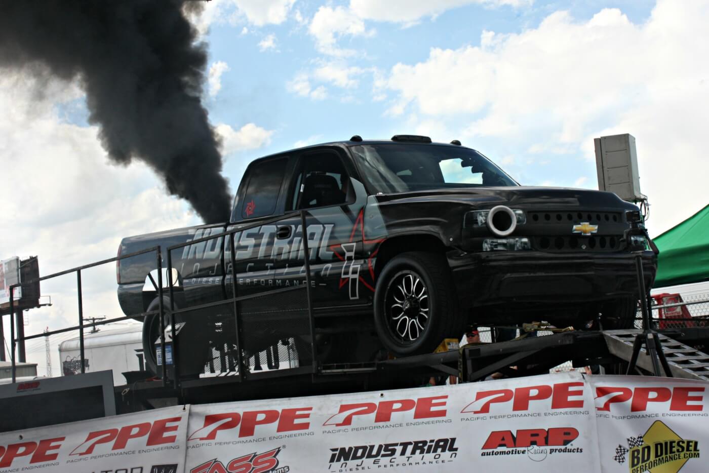 After a catastrophic engine failure just two weeks prior, the Industrial Injection Duramax was back up and running with another full competition motor, ready for the rollers again. On the hunt for that ever so impressive 2000hp, they opted to play it safe on the virgin engine and keep the nitrous jets conservative—if you can consider 1630hp conservative of course—which was still enough to claim highest horsepower on the day.