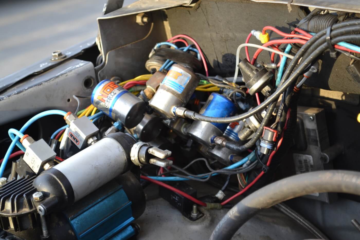 13. Often, racers find it easier to simply add another complete nitrous kit rather than upgrade bottles, solenoids, and nozzles separately. Serious giggle gas junkies will often have four, five or even six solenoids on a single engine.