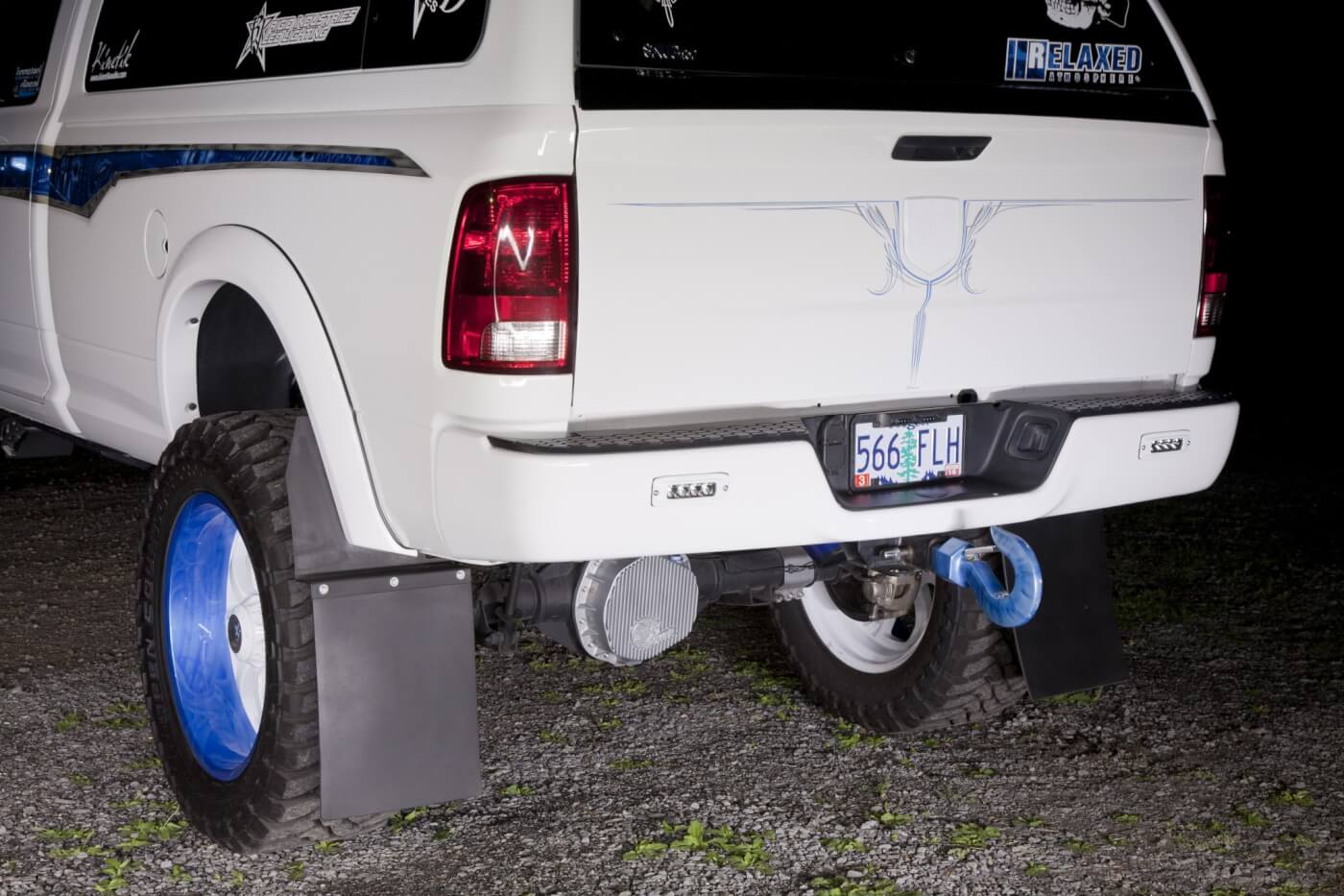 Pin stripes, a color-matched bumper and Monster Hooks tow hook adorn the truck’s rear.