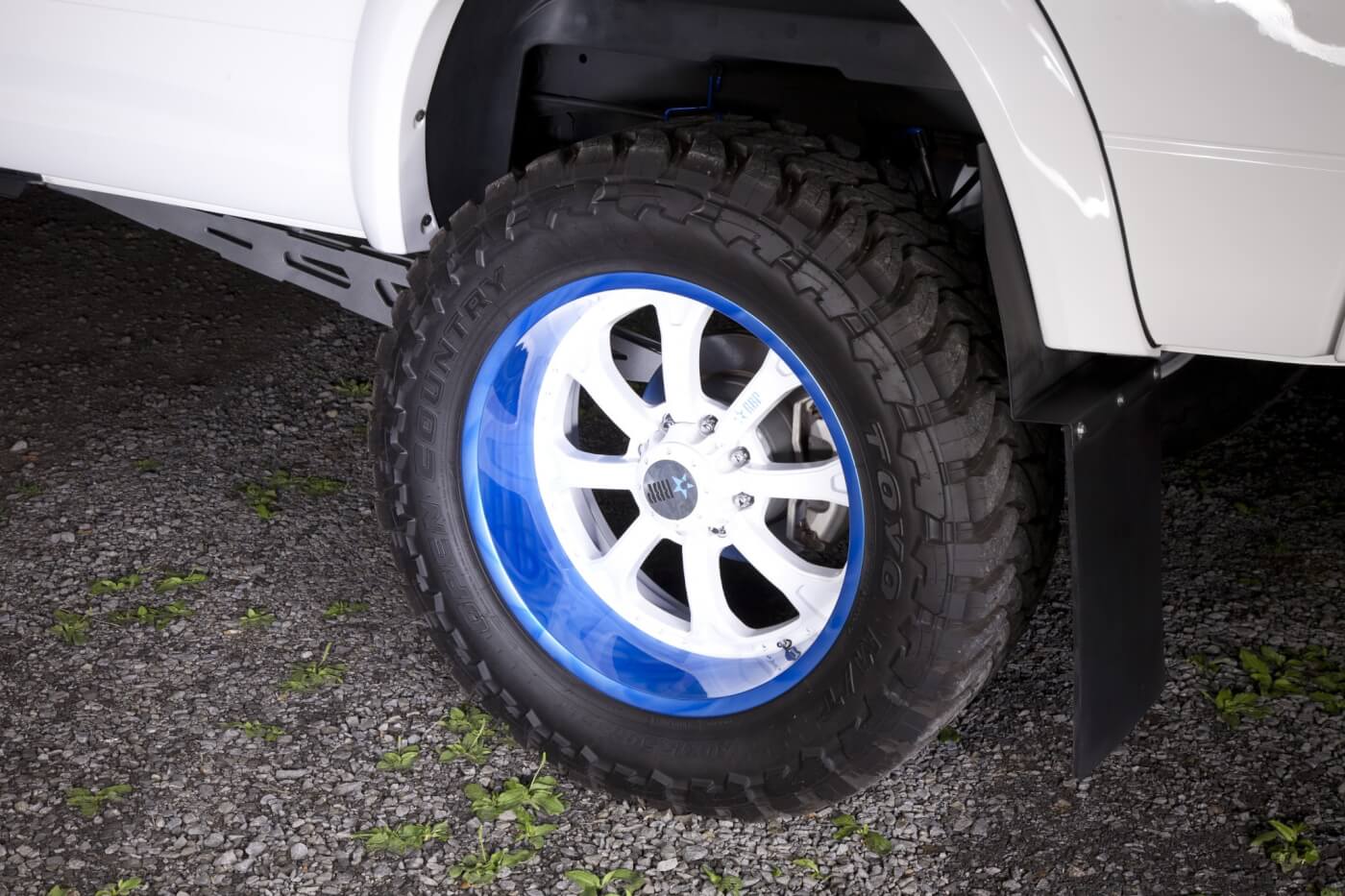 A set of 24-inch customized RBP Wheels is wrapped with 40-inch tall Toyo Open Country MT tires.