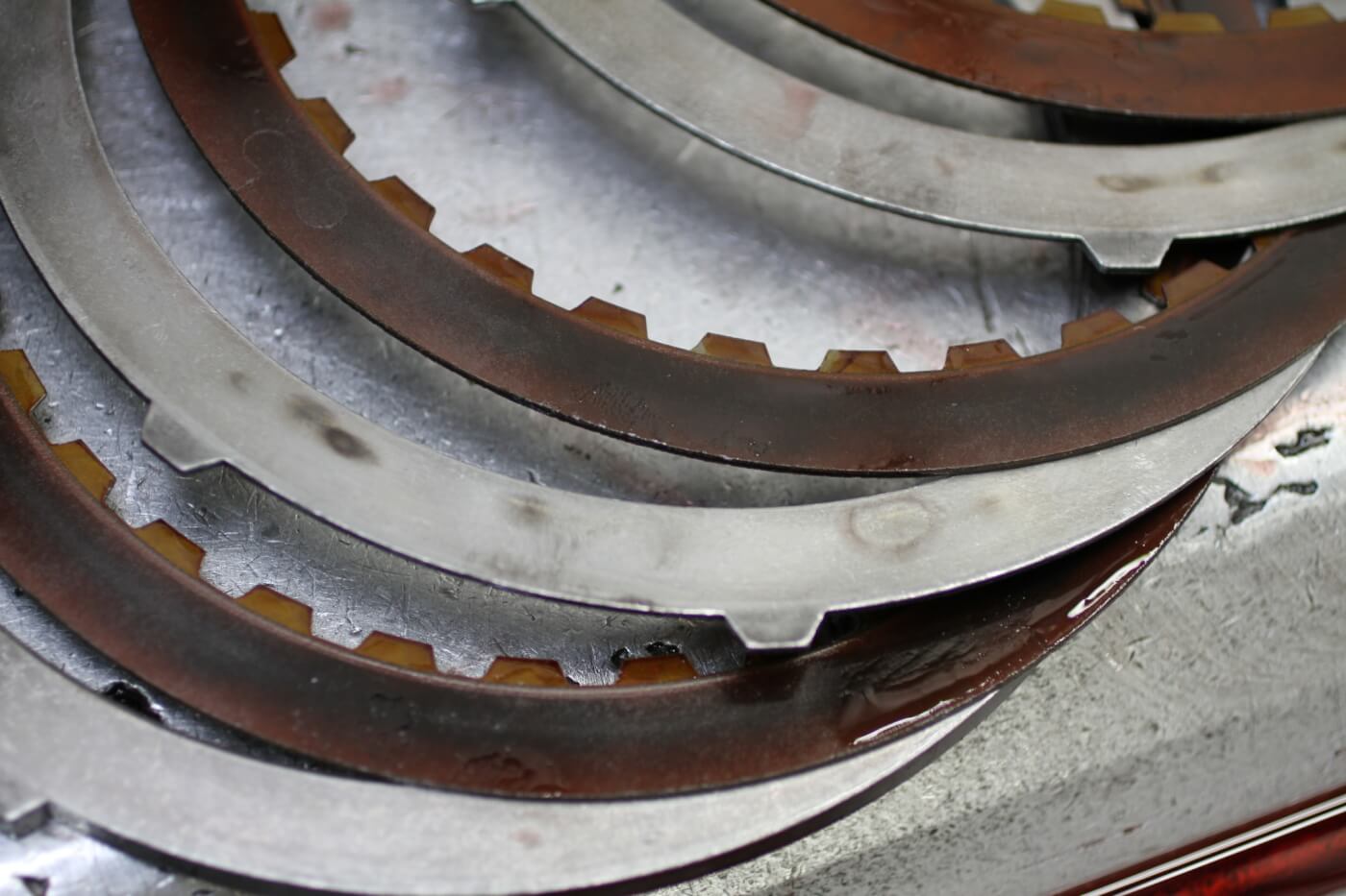 3. The inspection process revealed that the clutch fiction plates were worn and showed signs of heat damage. These wear parts will be replaced with new and better components, as is standard, regardless of condition. 
