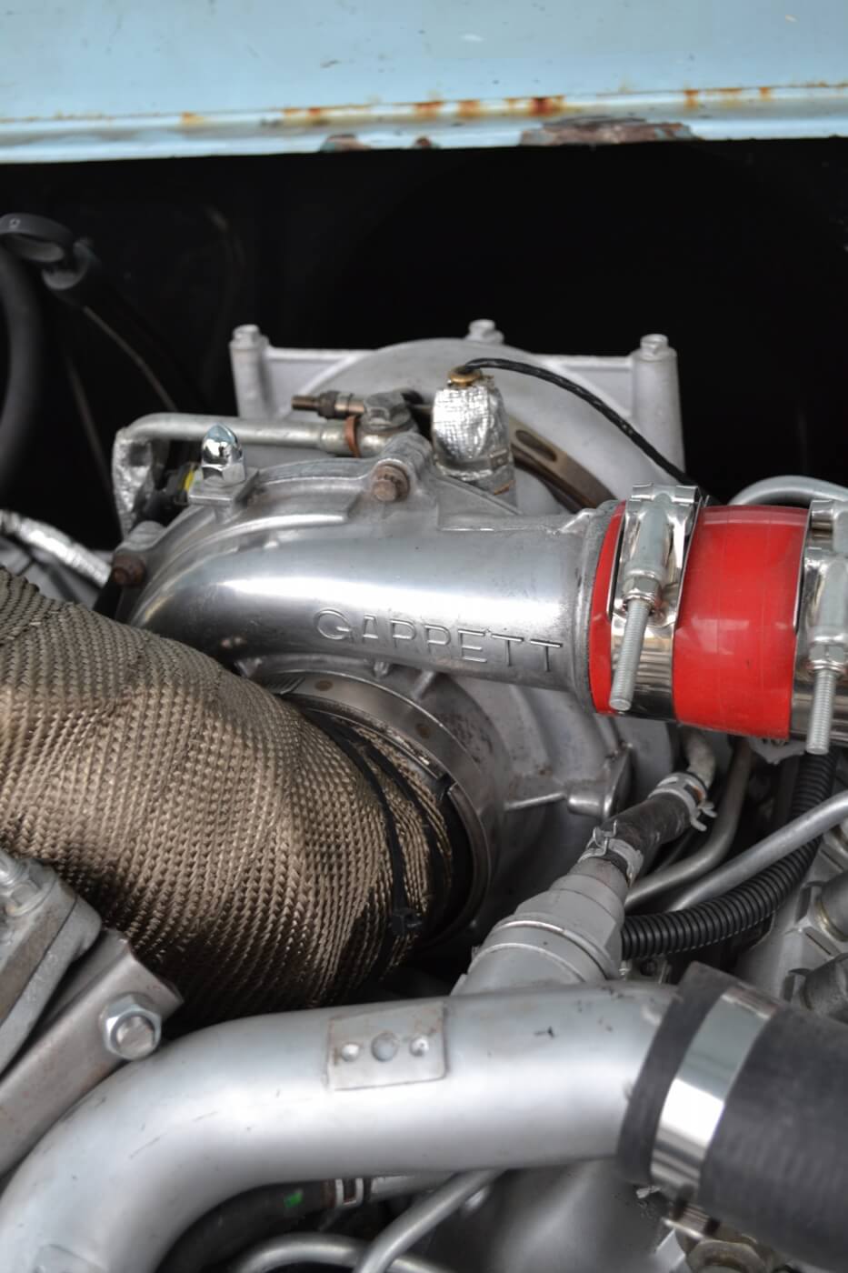 The stock Garrett turbocharger has been upgraded with bright red silicone boots and a heat-wrapped intake, but otherwise is stock, and puts out around 25 to 30psi of boost.