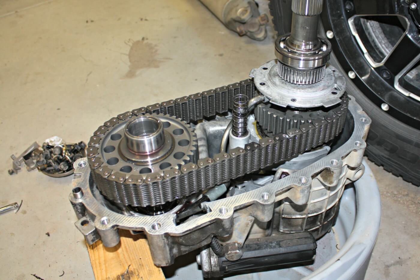 16. If you’ve never seen the inside of a transfer case, they can be a bit intimidating, but swapping out the pump itself is a fairly straight forward and easy task. The pump (located on the right) will slide right off the tail shaft once the snap ring, bearing, and gear have been removed.