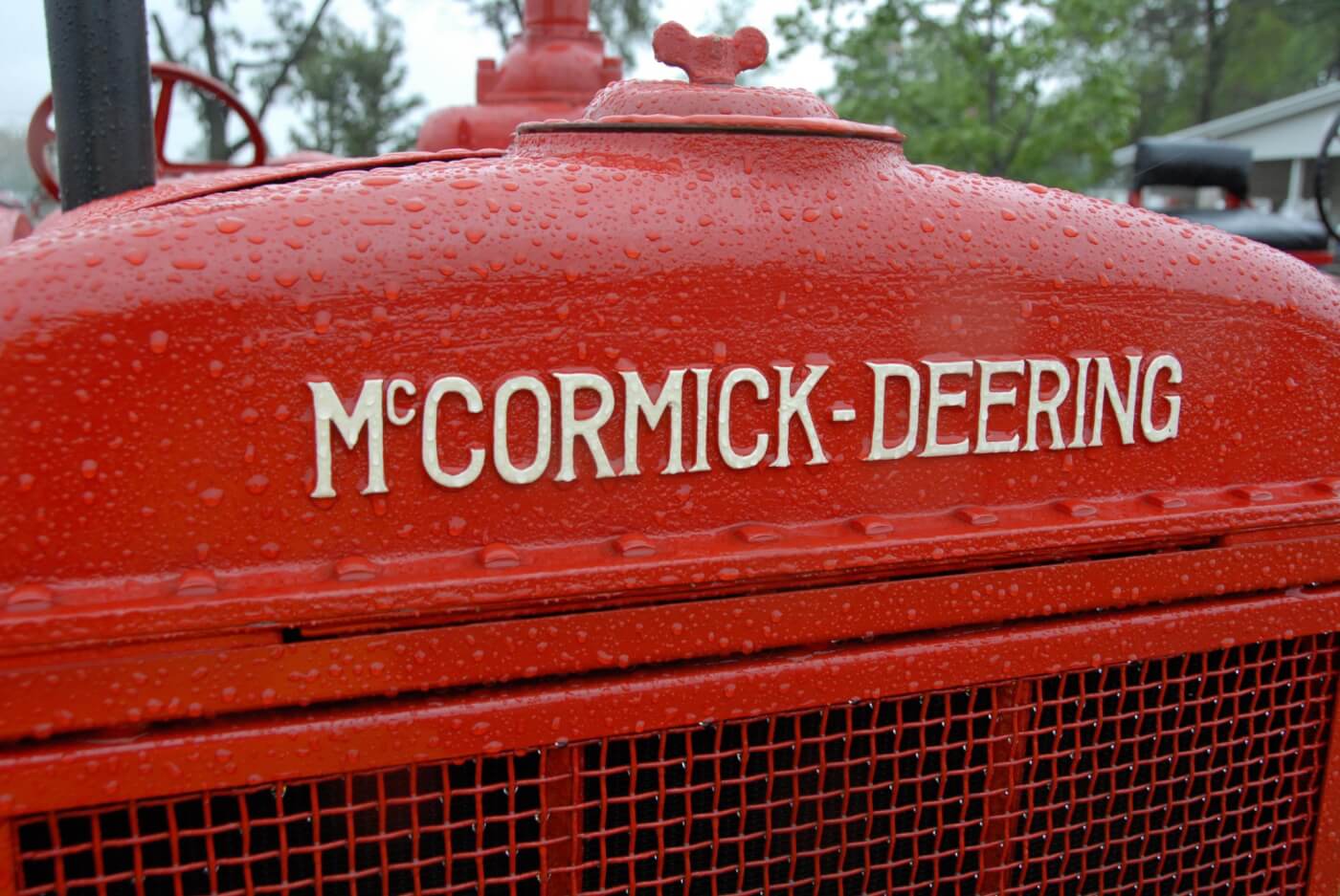 McCormick Chrome And Red Enamel Tractor Badge