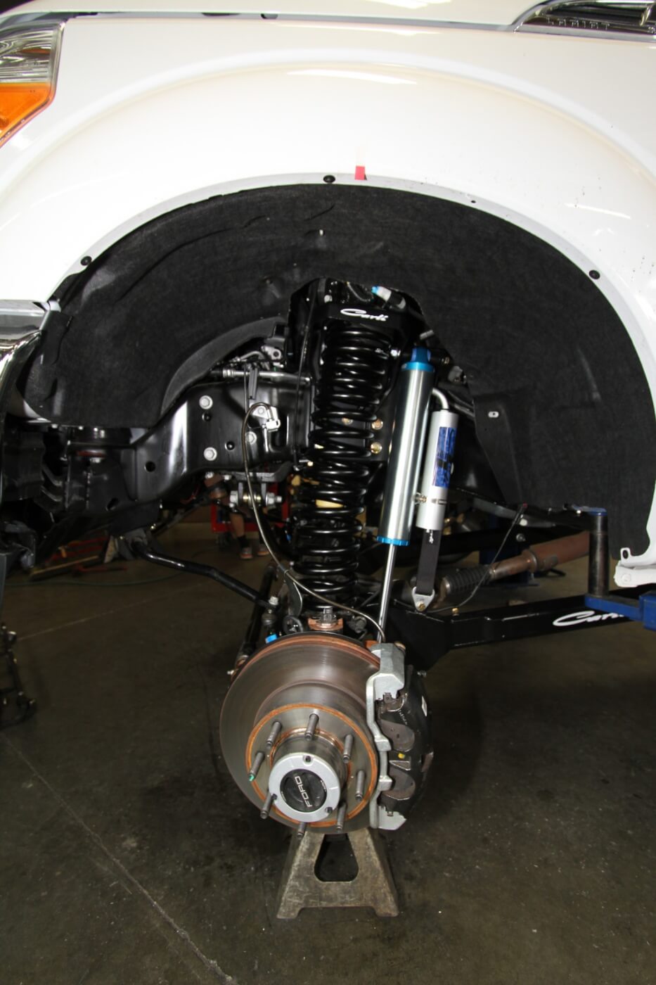 9. Here you see the completed front installation of the Carli 3.0 Dominator kit on our Ford F-250. It’s a clean, rugged and functional system that is far superior to the stock setup for ride quality, height and added travel for rutted roads and trail.