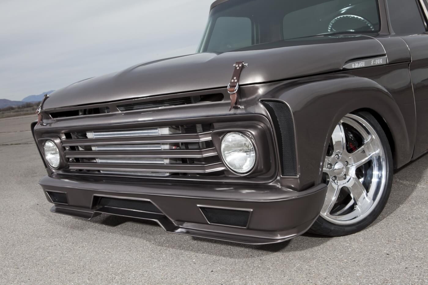 Instead of slamming his classic Ford on the ground, Weaver moved the front suspension forward and the fenders up on the truck to give the truck its one-of-a-kind stance. 
