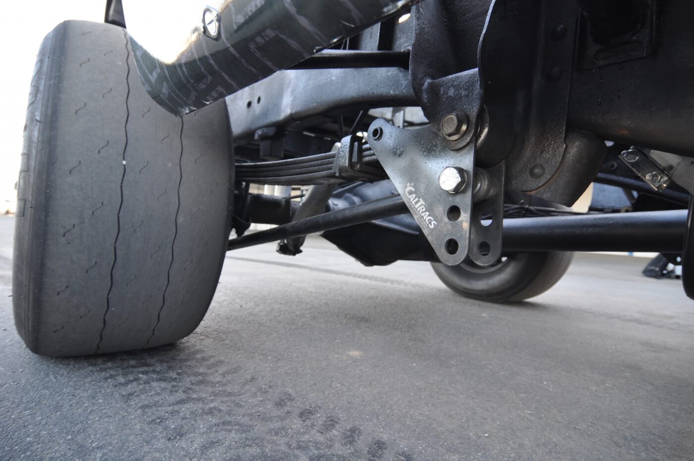 CalTracs traction bars are essential to reducing axle wrap and increasing traction. Of course, the race slicks are a big part of the traction equation too.