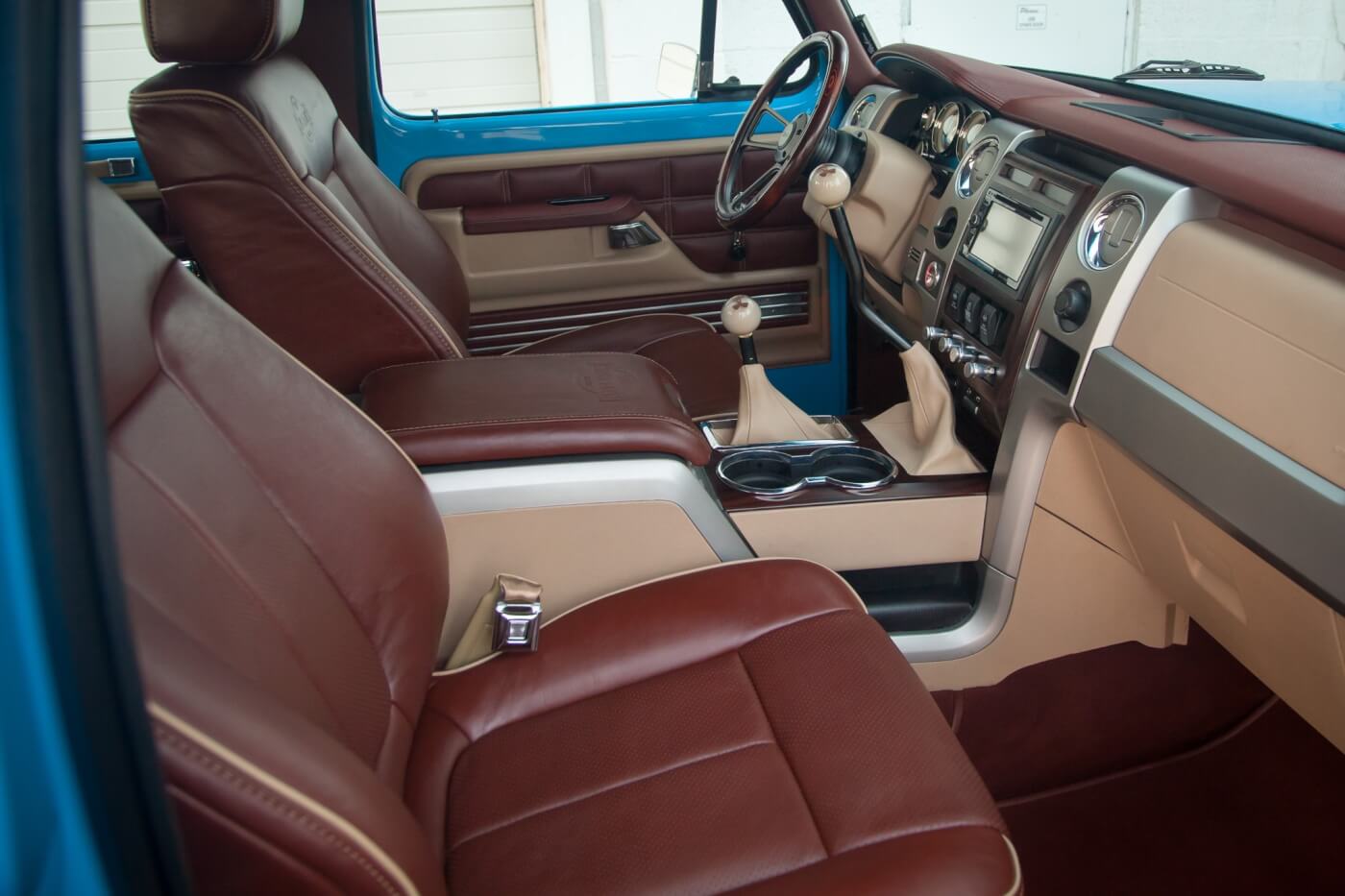 Other than the painted window sills and custom steering wheel, you’d never know you were driving a 1977 truck but rather a new King Ranch Super Duty.