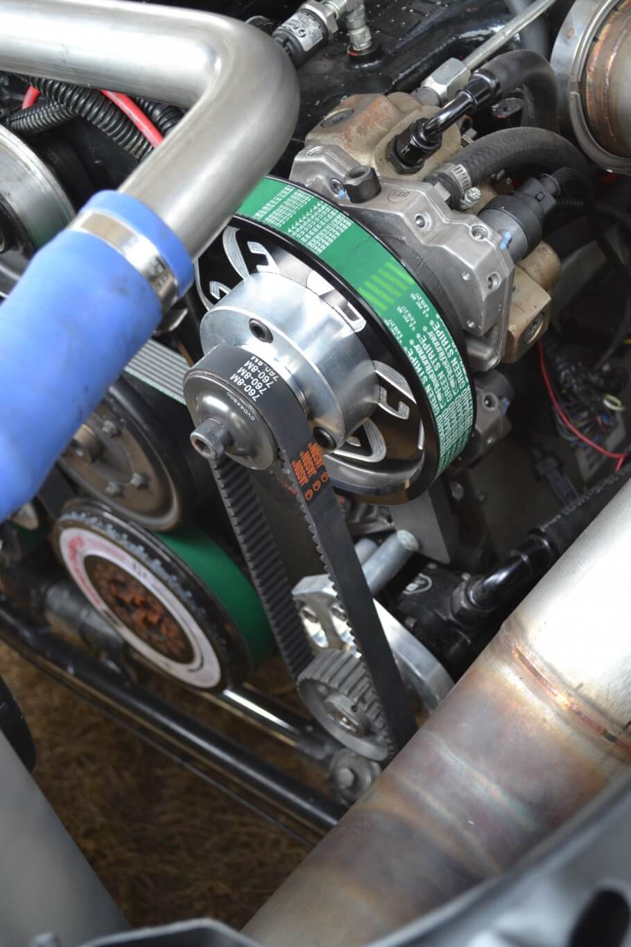 The fuel system on Ben's drag truck is quite a sight. The lift pump flows an incredible 6 gallons per minute (360 gph!) and is driven off the FPE dual CP3 drive. The upper CP3 is a FPE Powerflow 750, as is the lower CP3. Both pumps send fuel to mammoth 450-percent over injectors from S&S Diesel Motorsports.