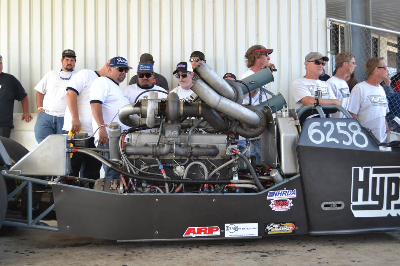 Perhaps the most awe-inspiring vehicle in attendance was the triple-turbo, 3,000 horsepower Hypermax dragster. Based on a DT466 platform, the stroked 8.2L engine powered the rail to high 6-second passes all weekend.