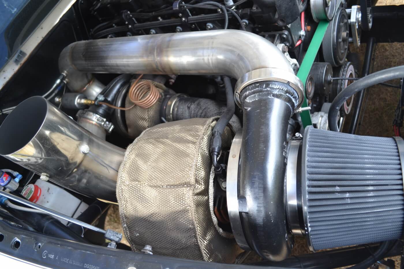 The turbo system on Ben's drag truck is quite impressive, and it has to be, to flow enough air for nearly 1,600 horsepower. The most visible air mover is a Garrett GT5541R turbo, which is a whopping 106mm in size.