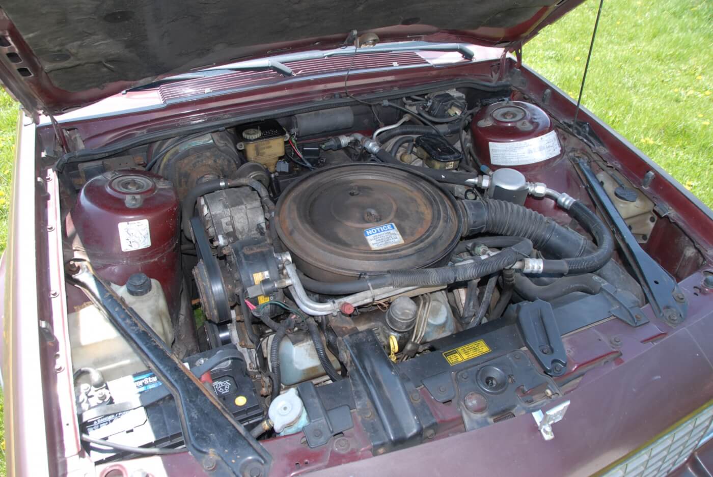 The 4.3L diesel was the biggest and heaviest powerplant to be fitted into the front drive A-body platform, and it pretty much fills the engine compartment. The 4.3 was shorter than the 350 but just as wide. The serpentine belt setup used on the front-drive cars both lightened and shortened the engine.