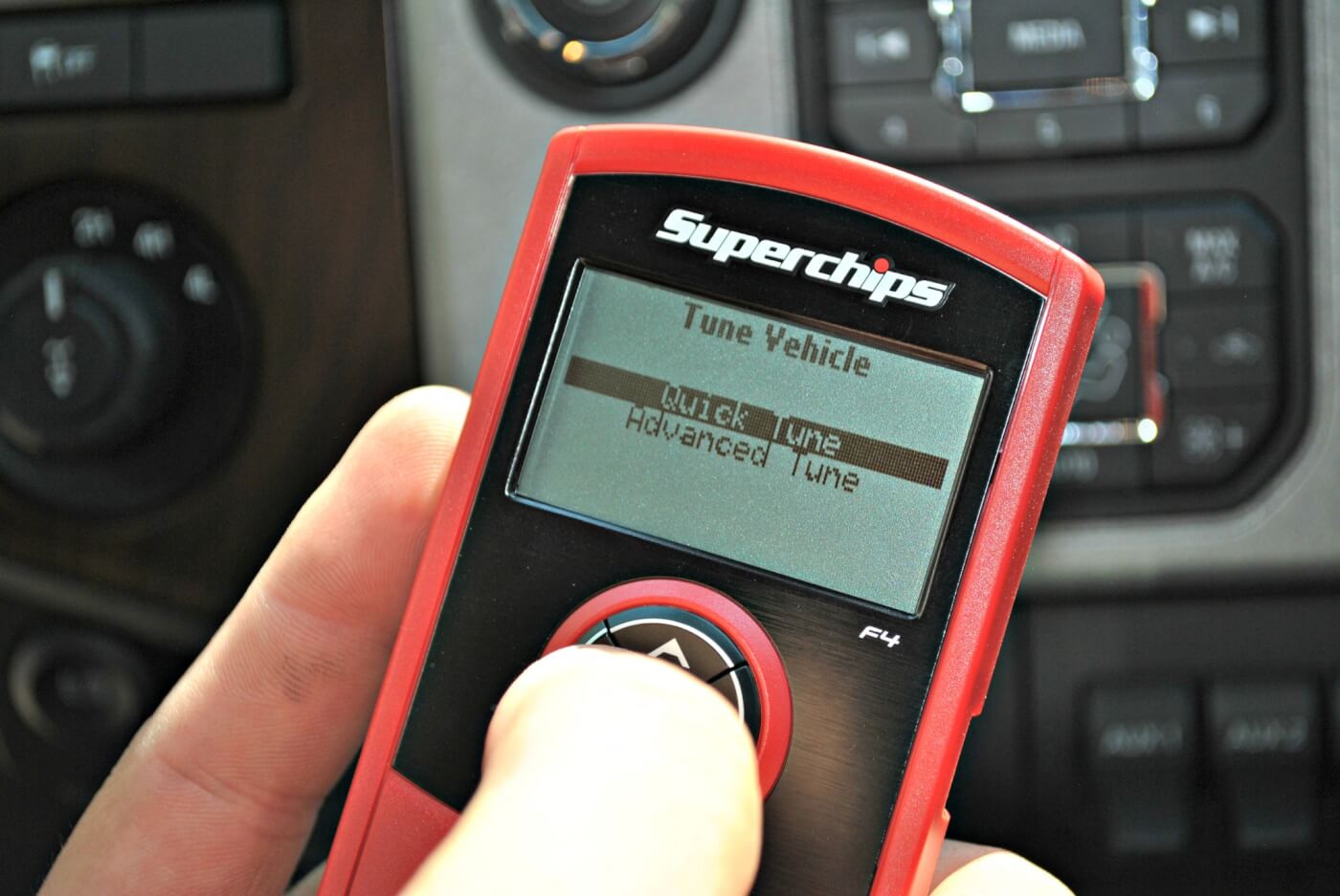 2. Like their earlier model handheld tuners, the Superchips F4 is a user friendly tuner that offers complete plug ’n’ play installation—no tools, no wiring, no opening the hood. By simply plugging into the OBD-II port under the dash, the F4 accesses the truck's on board computer. It can save the factory file and replace it with Superchips' own files for Mileage, Towing or Performance.