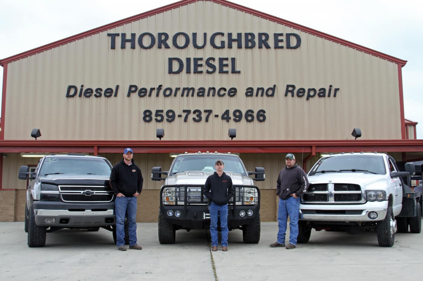The Stock class winners included second place Larry Bailey, winner Jonathan Rhoades and third place Jarrod Cox (from left to right), shown here posing with their trucks.