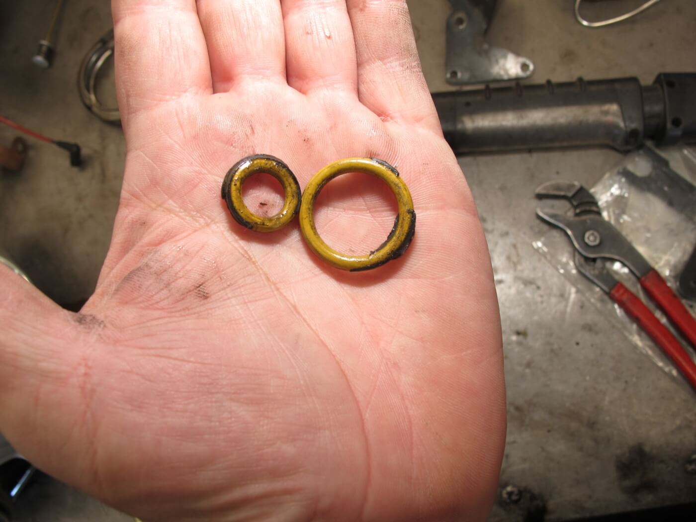 8. These are the turbo pedestal O-rings. They must be changed every time you remove the turbo, to prevent oil leaks. 