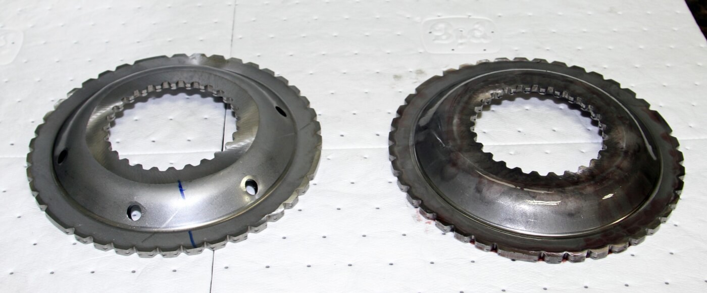 13. Merchant uses a new Allison P1 drive flange (seen on left) since many of the original drive flanges are worn, especially in high-mileage transmissions. The drive flange wear typically happens at the internal splines that lock around the P1 sun gear inside the transmission.