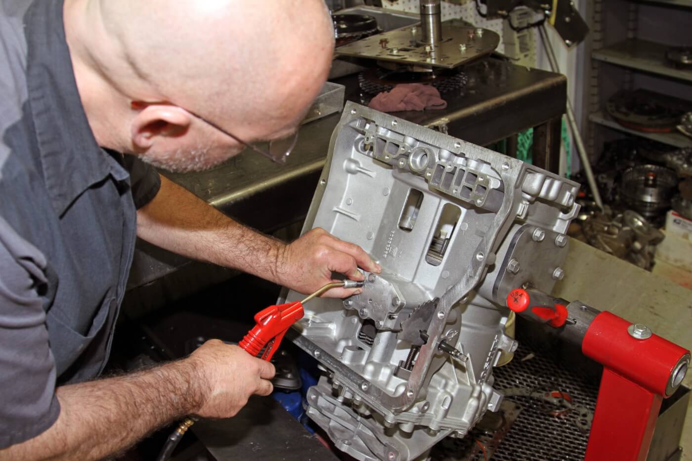 27. After the clutches are installed in the case, Delo uses air pressure and a Sun Coast machined block to test each clutch apply circuit, making sure that the transmission will work properly when it’s installed in your truck.