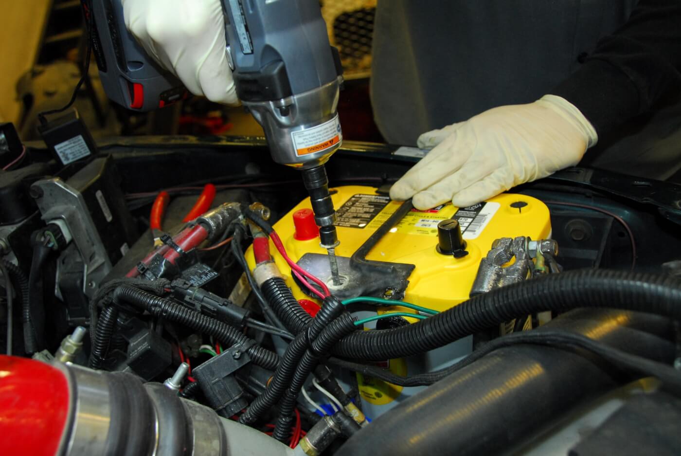 10. Use the factory hold-downs if possible to make sure the battery is secured. If they don’t fit, Optima provides additional braces for the tray.
