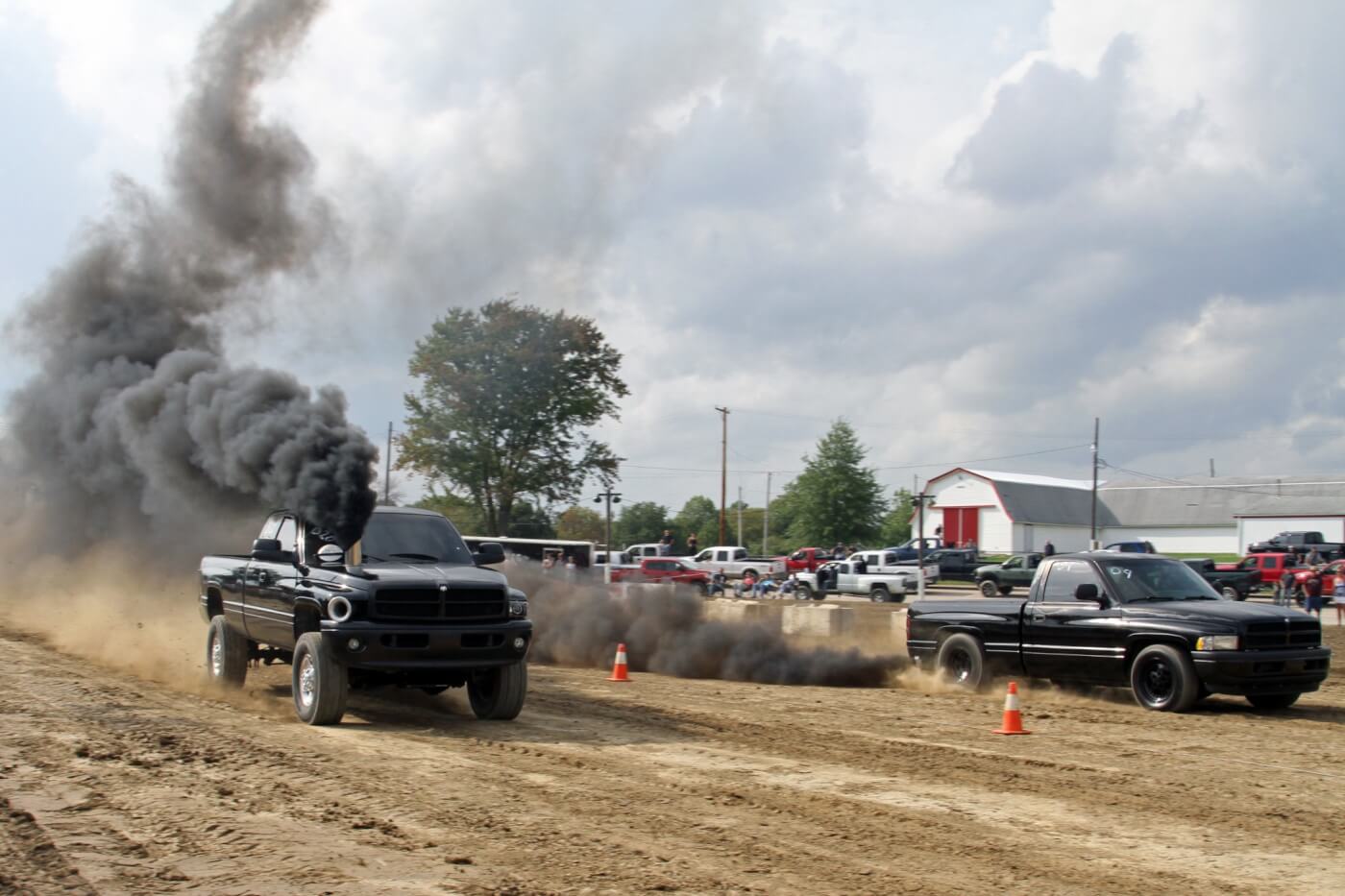Michael Cordova’s Cummins-powered 1998 Dodge Ram 1500 2WD truck (far lane) blasted down the track taking win after win all the way through the finals in the 2WD/Manual Transmission Diesel class.