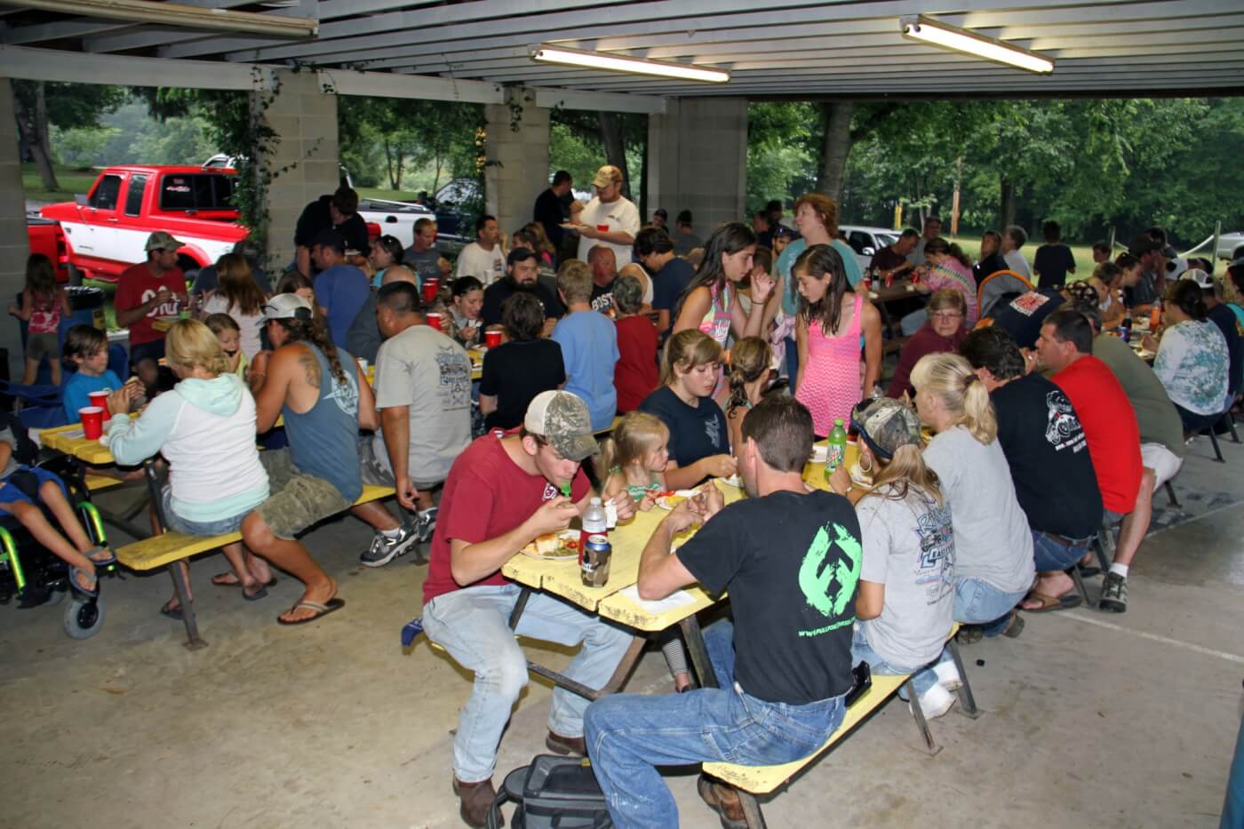 The rain did not dampen the spirits of the 2014 RRE attendees who gathered under the KOA pavilion for the traditional potluck dinner.