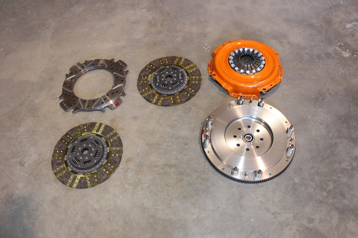 4. The multi-disc Diesel Twin clutch from Centerforce is a pretty serious unit that’s capable of handling up to 1,700 lb-ft of torque. The system consists of a new one-piece flywheel that replaces the problematic stock dual-mass flywheel, a pair of clutch discs, floater, pressure plate, and a new slave and clutch master cylinder. Multi-disc clutches are known for tremendous holding power, but they also have a reputation for being noisy, having rough engagement, and needing a large amount of pedal effort. Centerforce has gone to great lengths to overcome all the negative characteristics of a traditional multi-disc clutch in order to make a clutch with excellent holding power that acts just like an ordinary clutch, making it an excellent choice for a hopped-up daily driver or one that spends most of its time hauling heavy stuff.
