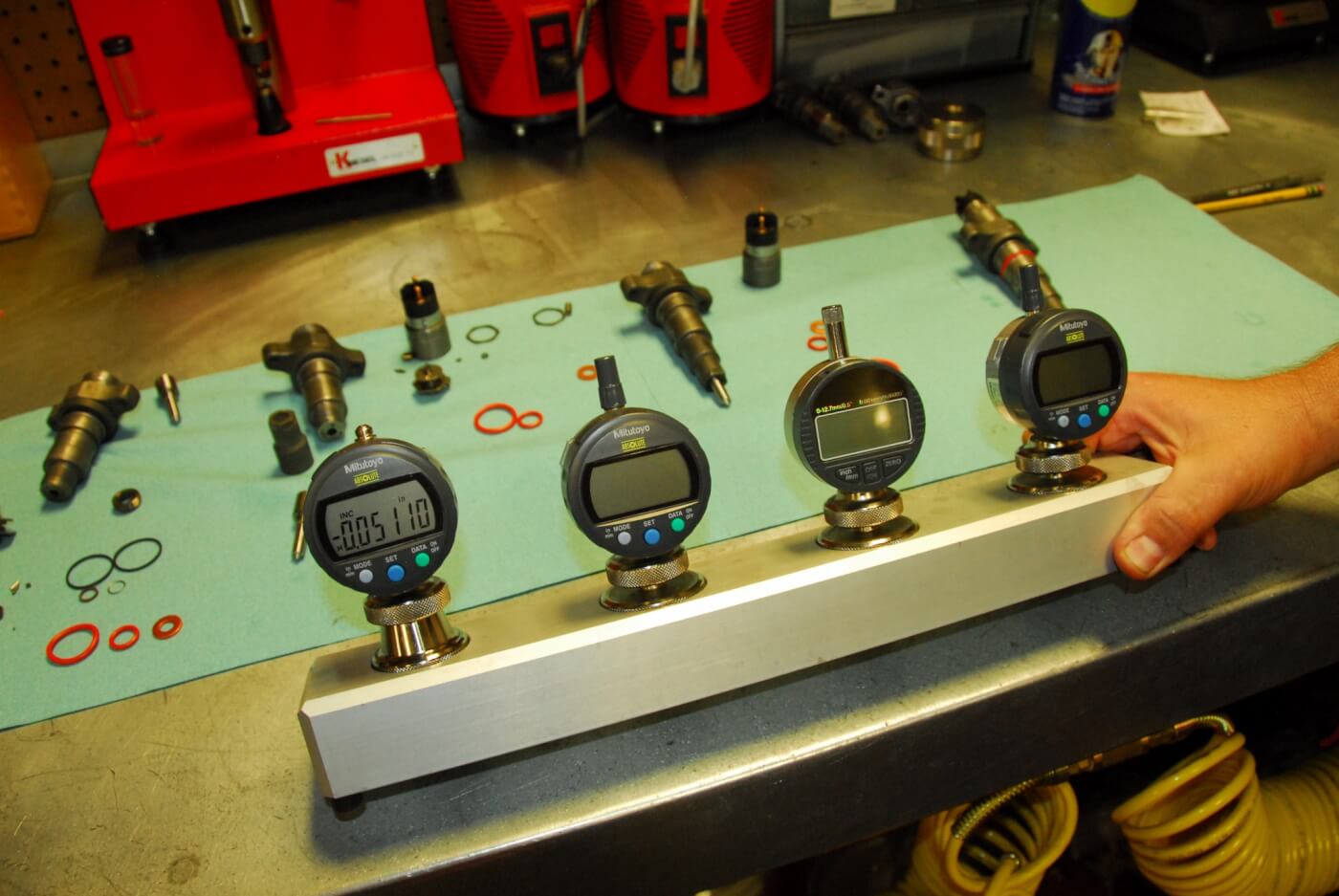 12. These four precision gauges are used for evaluating the air gap, and both the armature lift and nozzle lift of an injector.