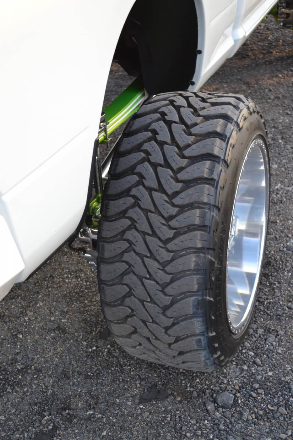 In this photo, one can see how far the wheels are set out for the famous "Cent-Cal" stance. The tires that give traction for towing, racing, or pulling, are the same 37x13.50R24 Toyo Mud Terrains.