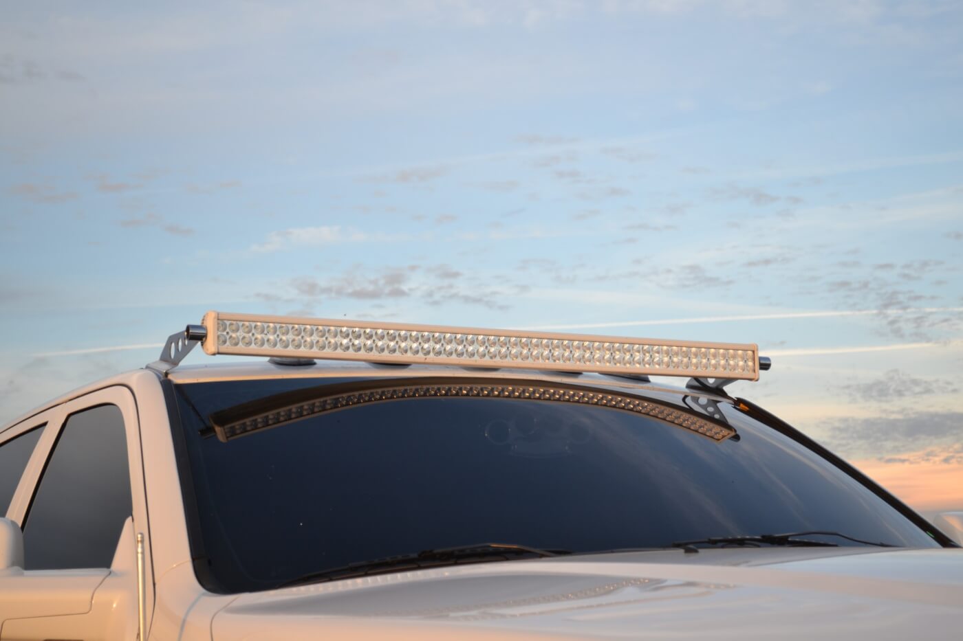 Since Joey heads to the coast on a regular basis, the lights in the grille weren't quite enough lighting when heading out into the dunes at night. To solve this, an additional light bar was mounted up on top of the truck from Rigid Industries.
