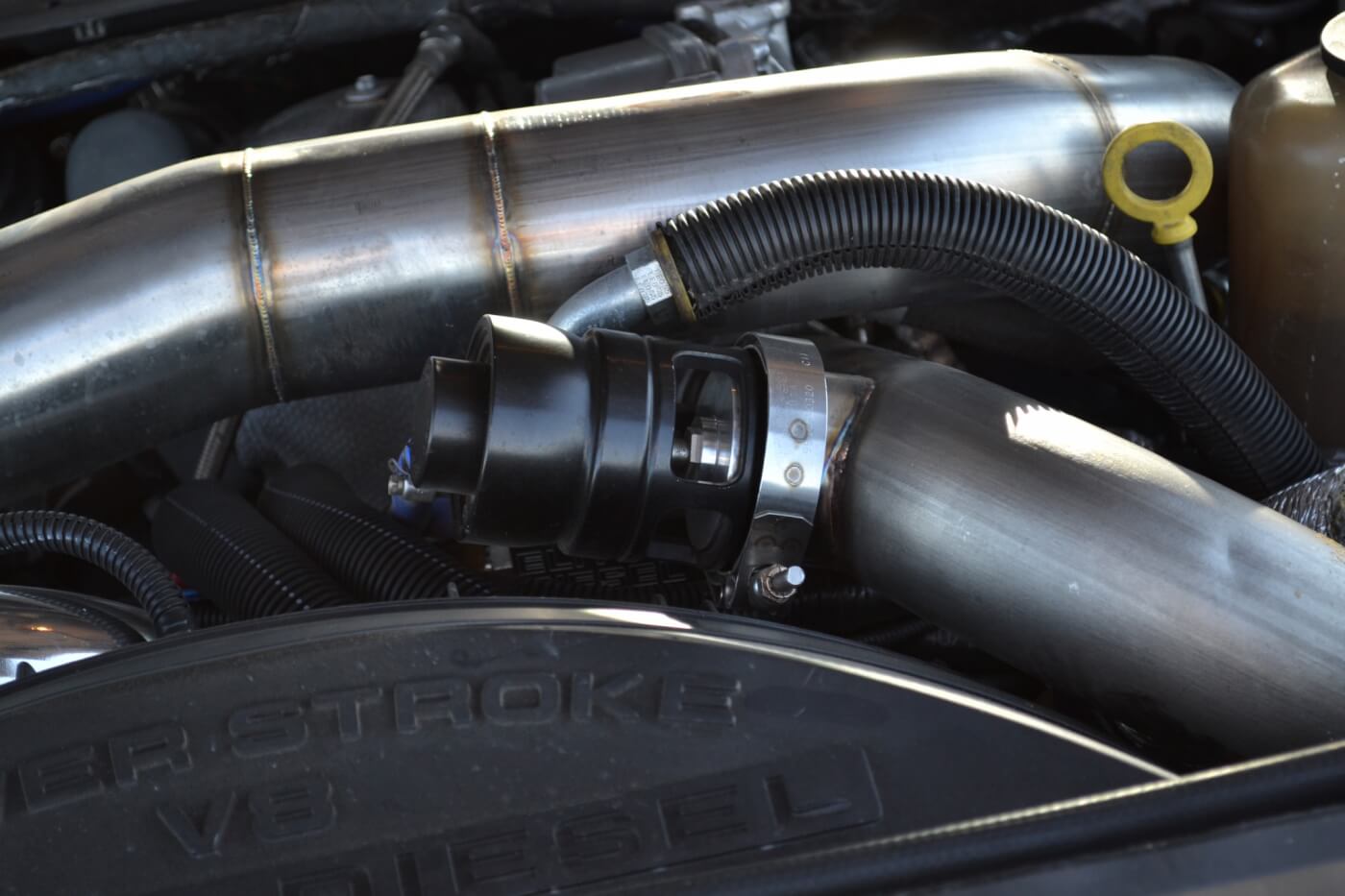 Chopping off the throttle quickly can create pressure spikes in the intake tract, so a blow-off valve was installed in the intake piping to keep compressor surge virtually nonexistent.