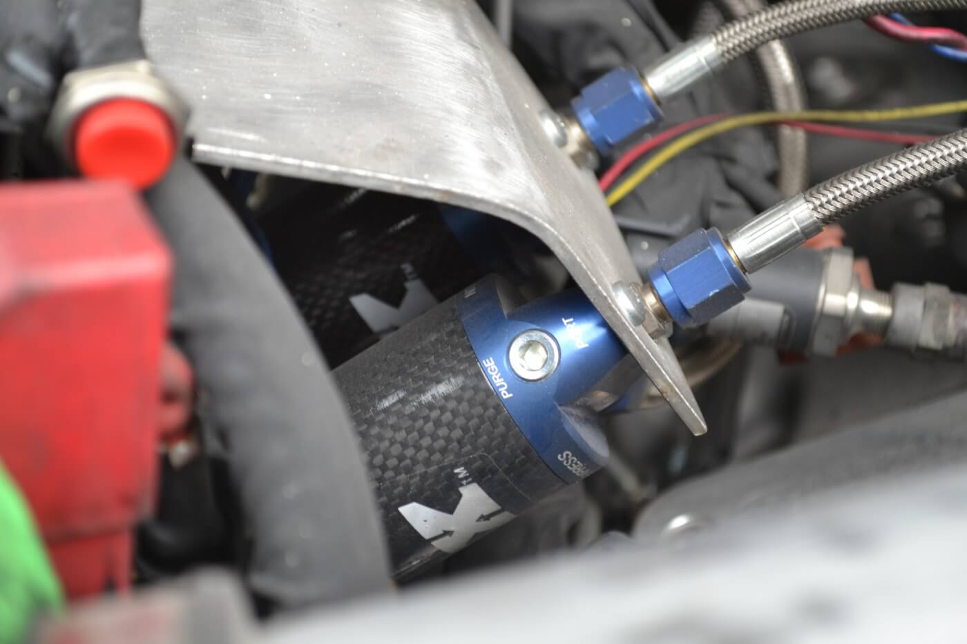 Morgan wanted to push the 6.7L platform as far as he could while retaining a stock-style turbo, which meant a lot of nitrous. Two big 0.125-inch solenoids are used for dyno runs, as well as dragstrip passes.