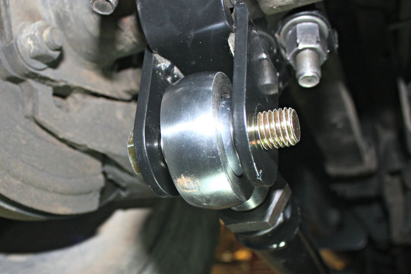 9. With the rod ends installed, the bards can be placed under the truck and the Grade 8 ¾-inch bolt slipped through the axle bracket and rod end holding the axle end of the bar in place. No need to tighten the bolt just yet, as the bars may come back out a couple times before final installation.