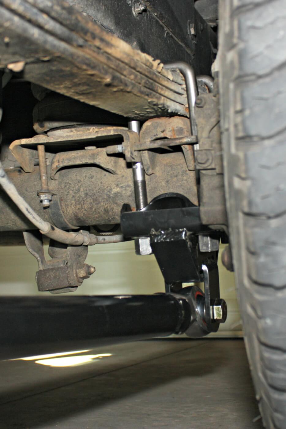 13. With the frame side bracket holes drilled and the hardware installed and torqued to spec, the traction bar can be installed for the last time. Repeat the process for the opposite side of the truck. All the hardware will need to be torqued to spec, supplied with the kit’s instructions, but be sure to re-torque all the hardware again after driving a few hundred miles.