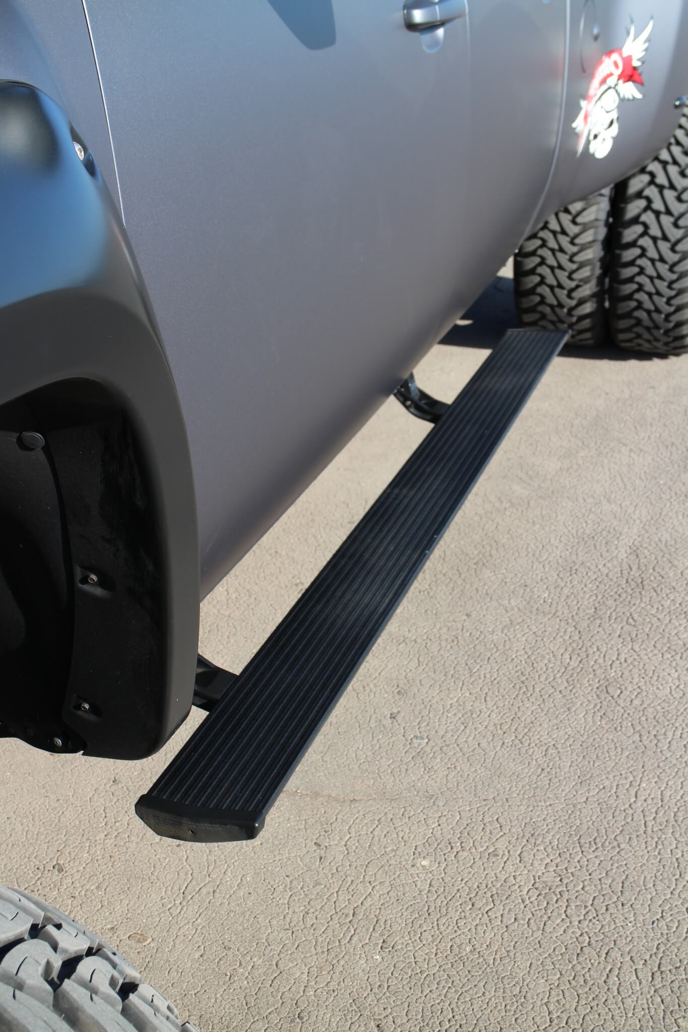 A pair of AMP Research retractable PowerSteps helps with easier access to the cab.